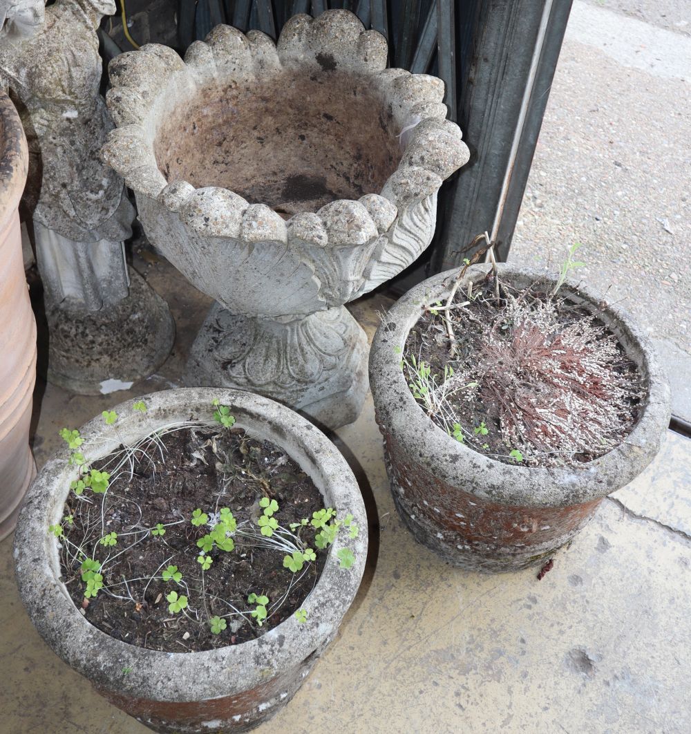 A pair of reconstituted stone garden planters together with a pair of larger campana garden urns, largest 50cm diameter, H.58cm